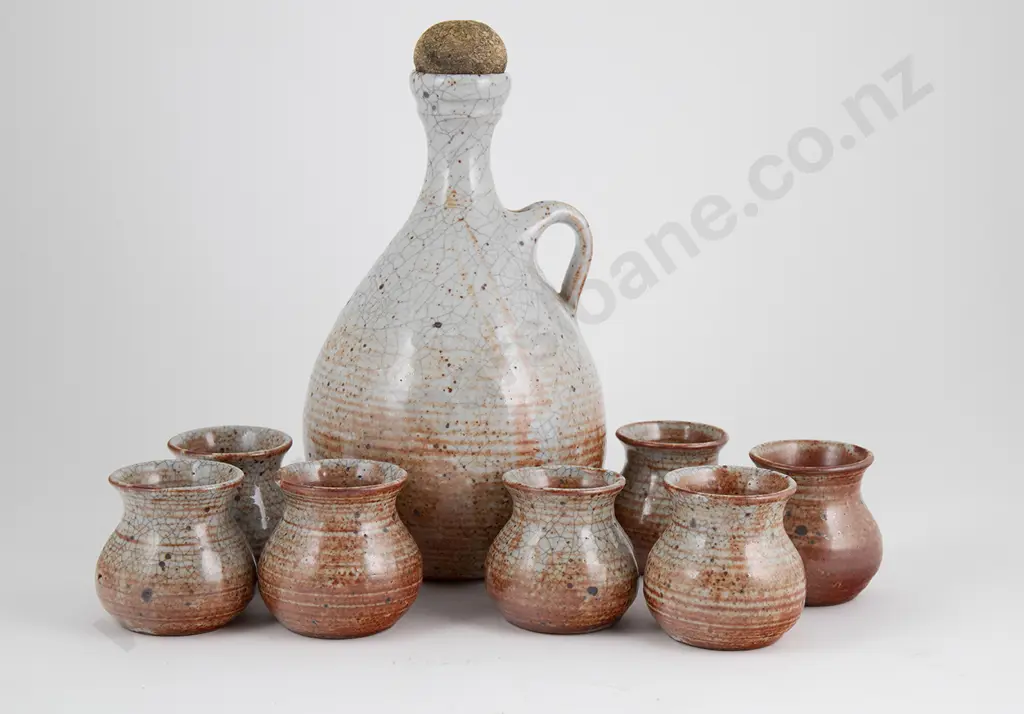 Rust Glazed Wine Flagon and Seven Cups Image 1++