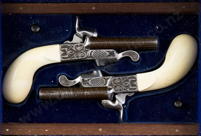 Cased Pair Ivory Handled Muff pistols Image 1++