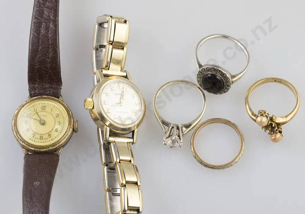 Two 18ct Rings, two silver rings and two wrist watches Image 1++