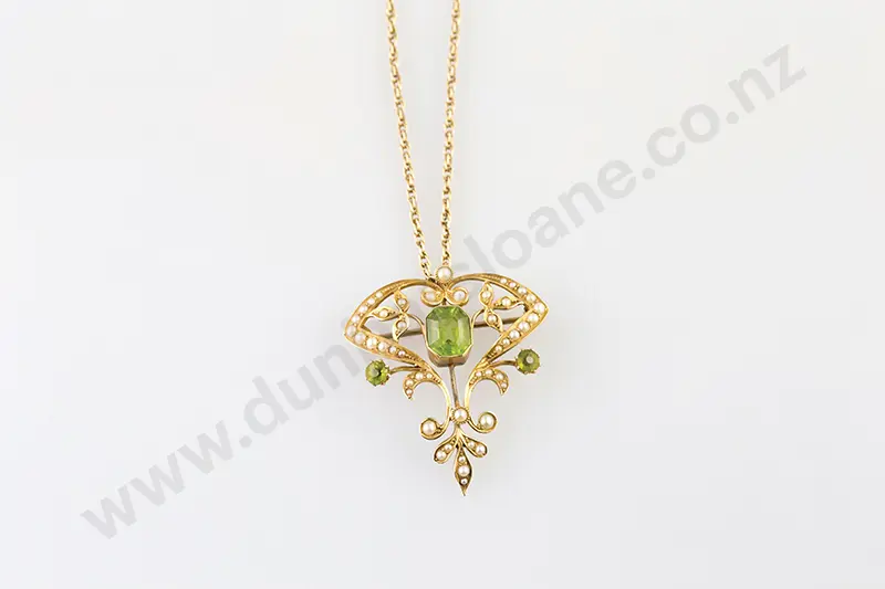 Edwardian 15ct Green Peridot and Seed Pearl Shield Pendant Image 1++