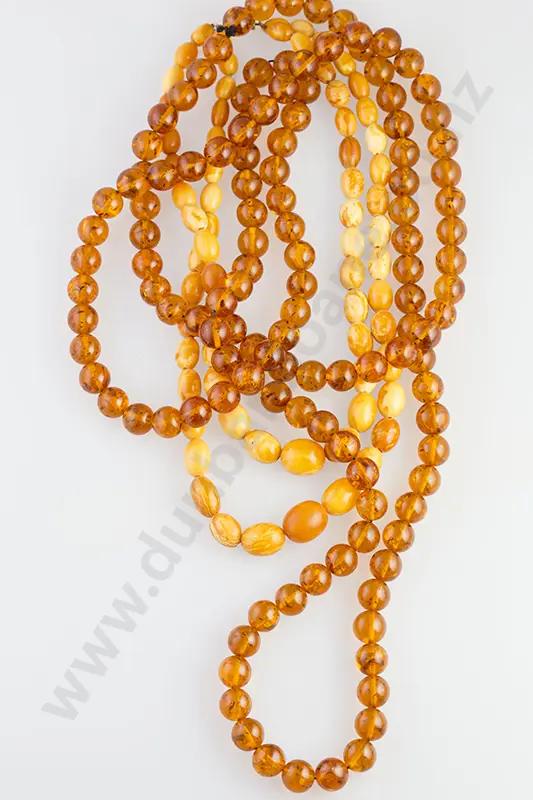 Two Short Opaque Amber Necklaces and Other Image 1++