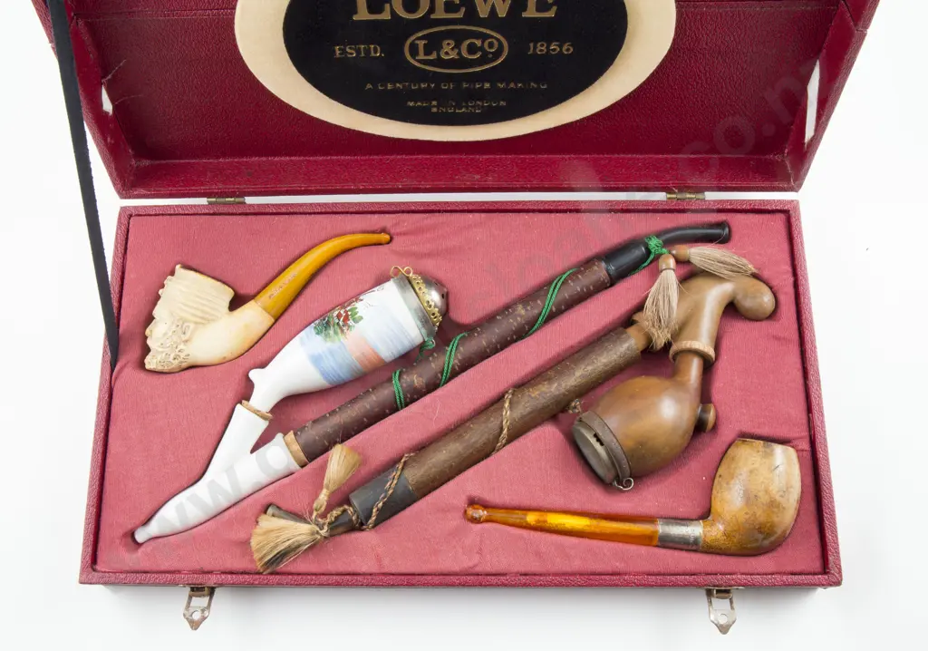 Cased Display Of Four Pipes Image 1++