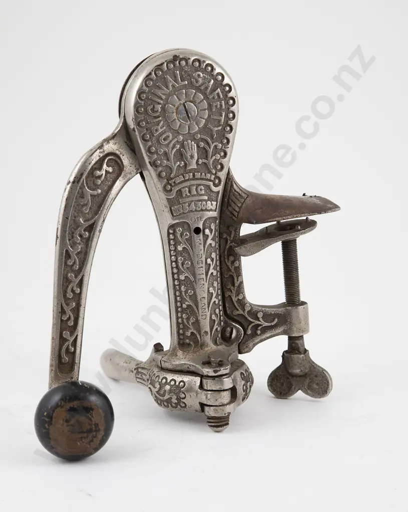 Chromed Steel "Original Safety" Bottle Opener Image 1++