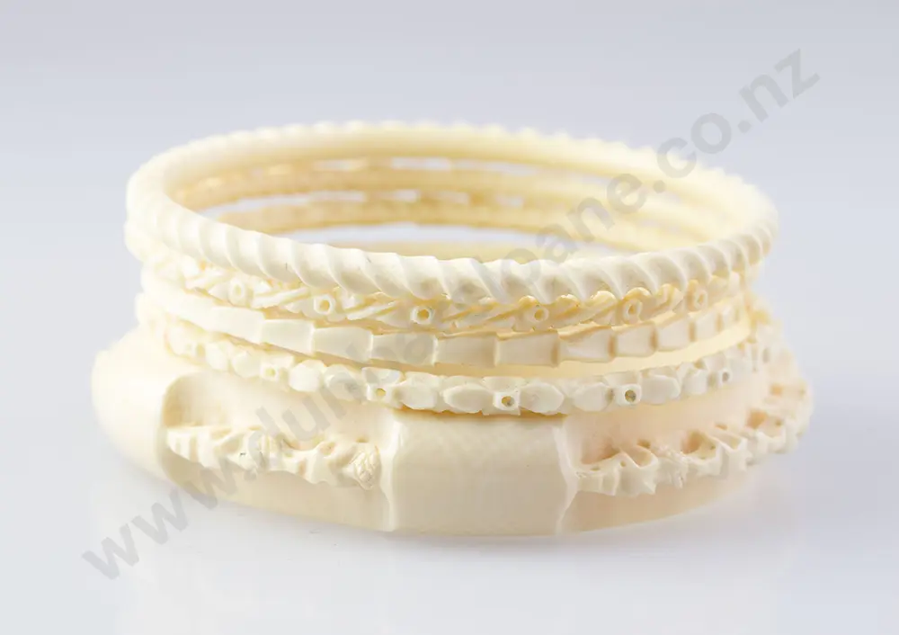 Five Carved Ivory Bangles Image 1++