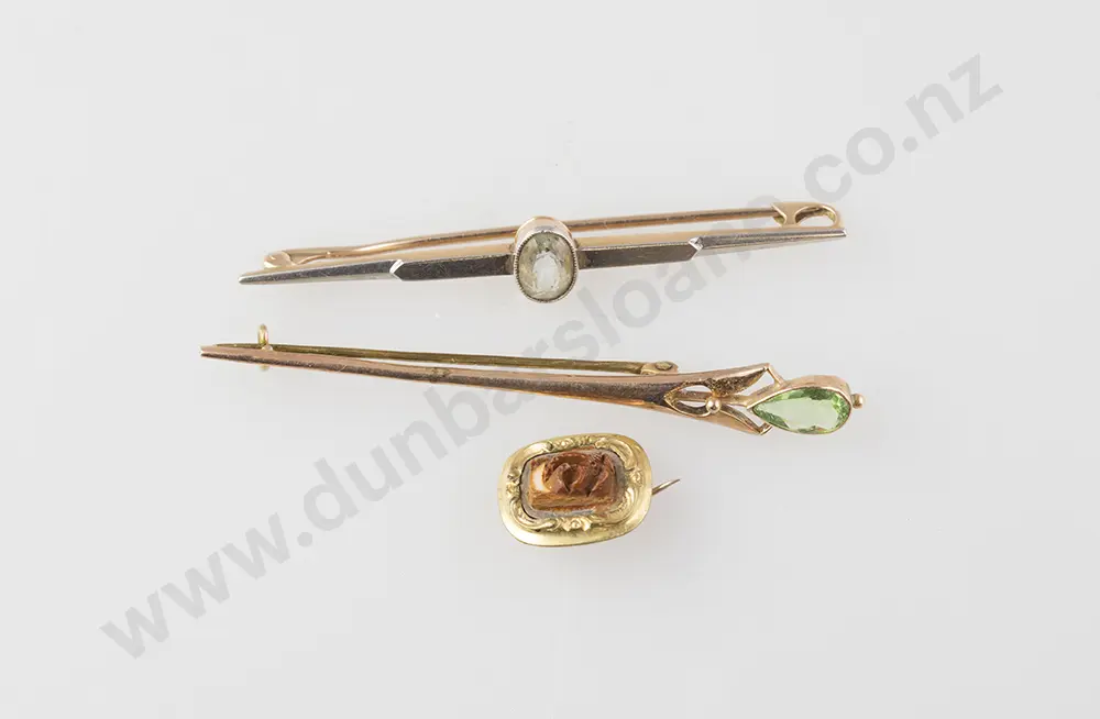 9ct Art Nouveau Single Peridot Bar Brooch with 15ct bar brooch and Victorian gold pin brooch Image 1++