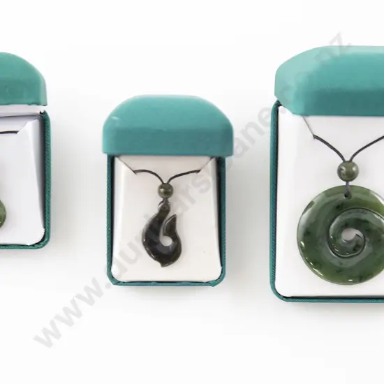 Three Greenstone Pendants