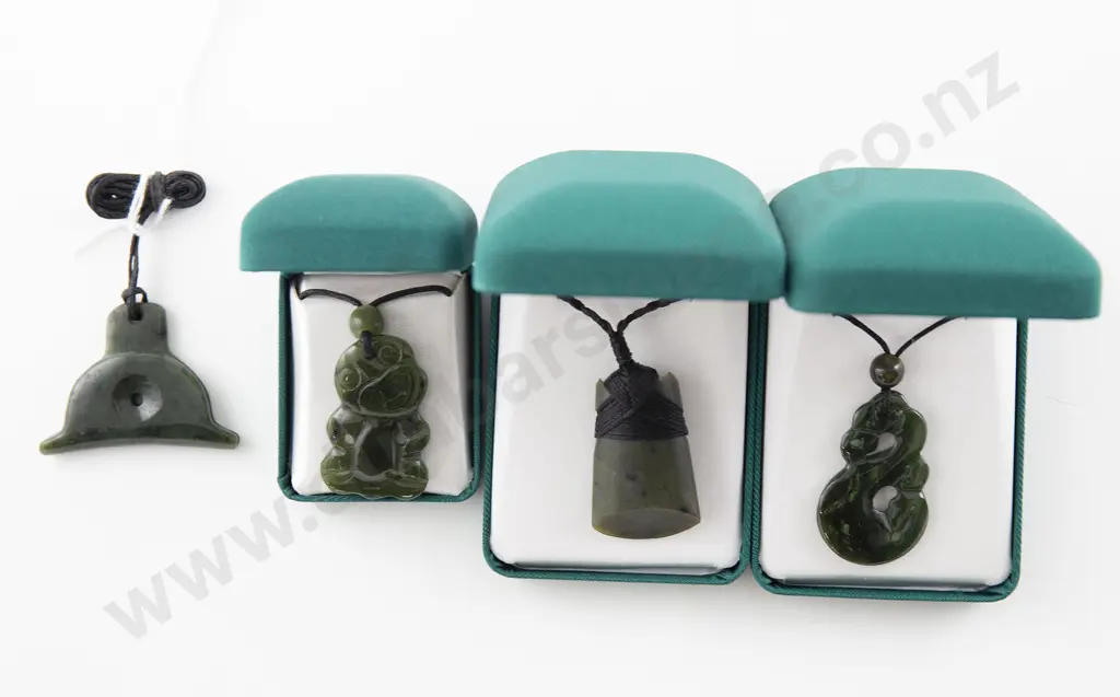 Four Greenstone Pendants Image 1++