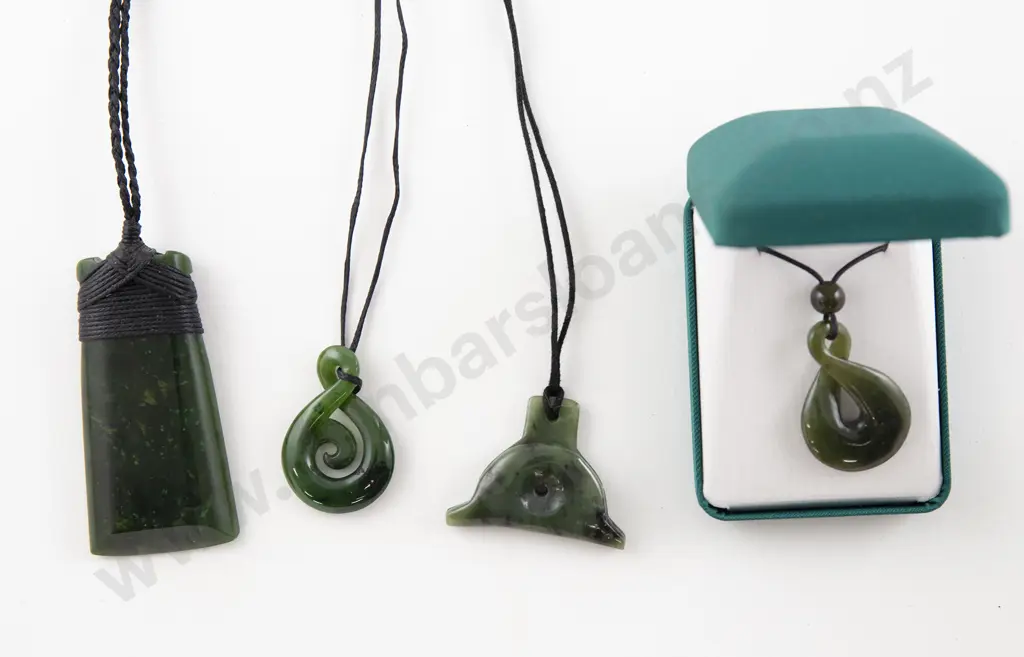 Four Greenstone Pendants Image 1++