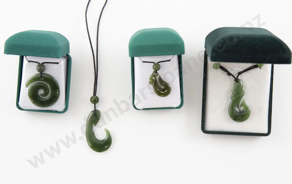 Four Greenstone Pendants Image 1++
