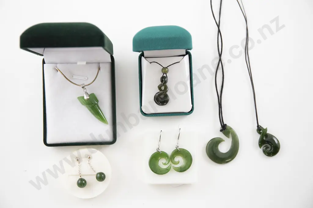 Four Greenstone Pendants Image 1++