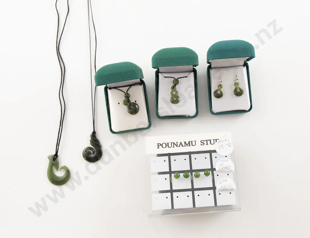 Four Greenstone Pendants Image 1++