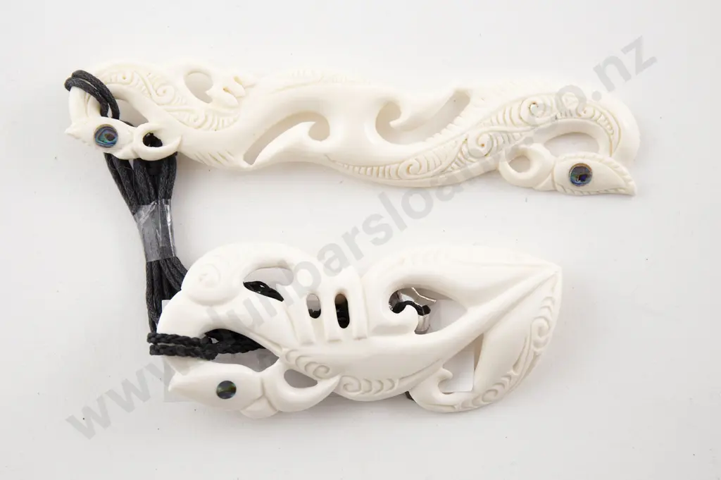 Two NZ Carved Bone Pendants Image 1++