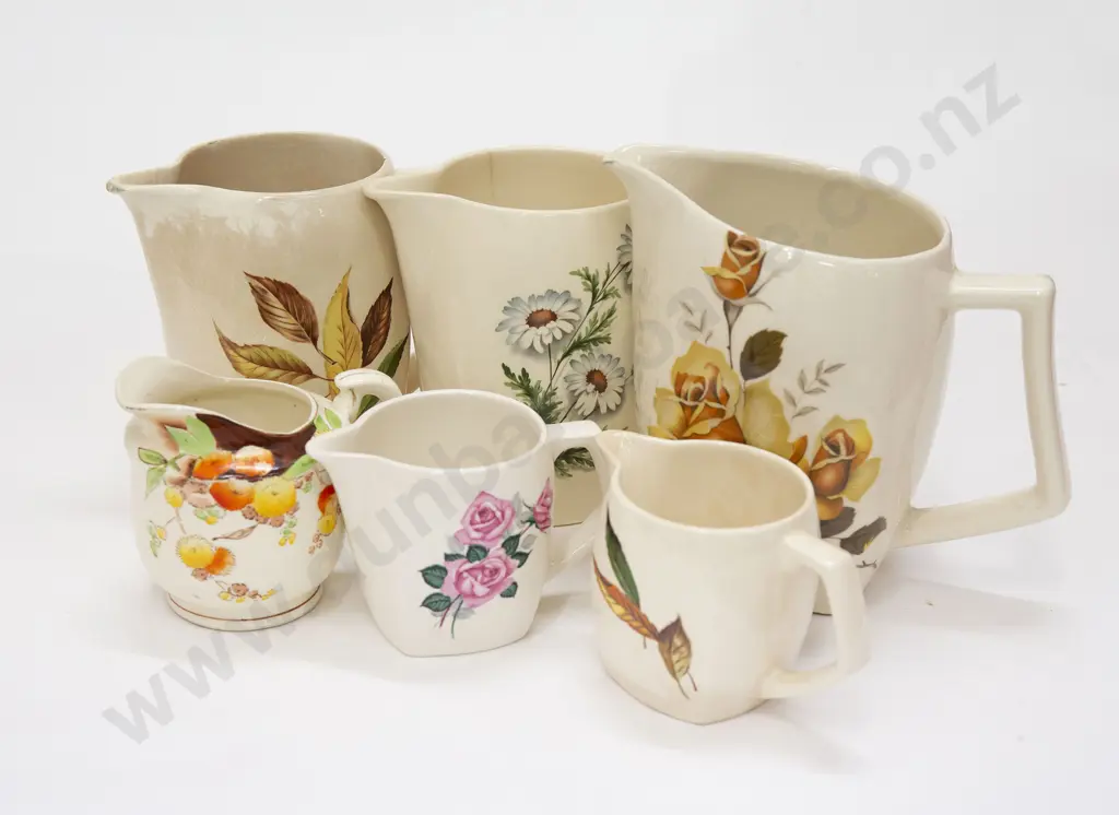 Six Assorted Crown Lynn Jugs (some a/f) Image 1++