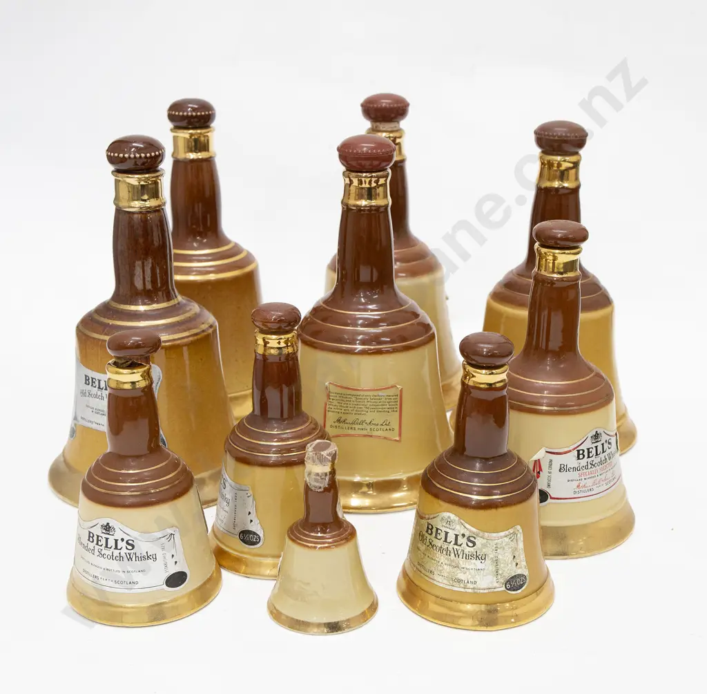 Quantity of Royal Doulton and Wade Bells Whisky Decanters Image 1++