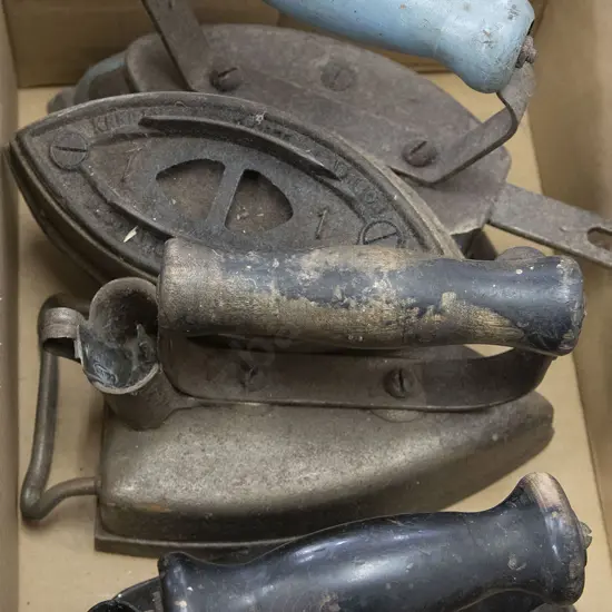 Four Colonial Irons