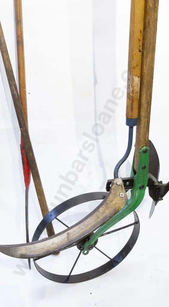 Single Wheel Hand Plough and three gardening tools Image 1++