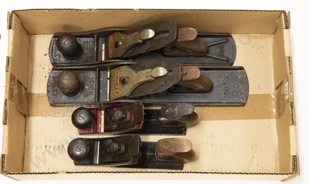 Four Assorted Woodworking Planes Image 1++