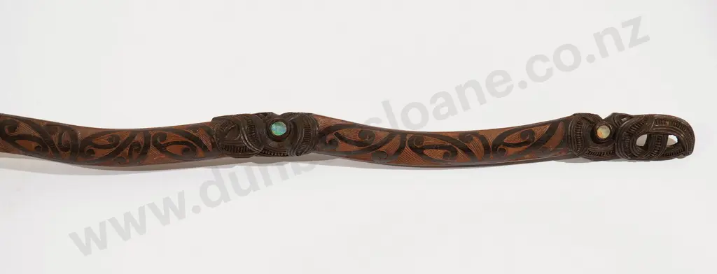 A finely carved hoe Image 1++