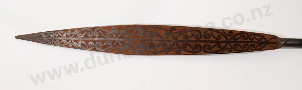 A finely carved hoe Image 1++