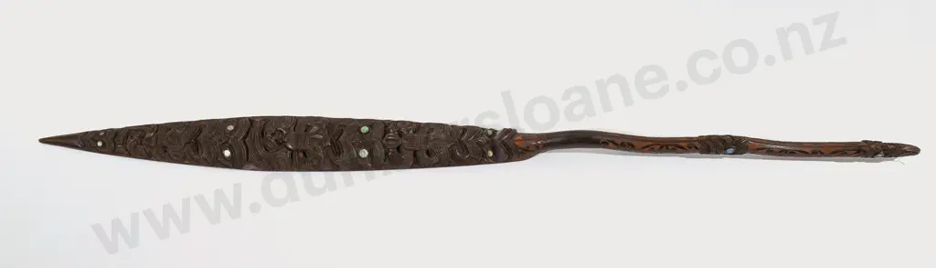 A finely carved hoe Image 1++