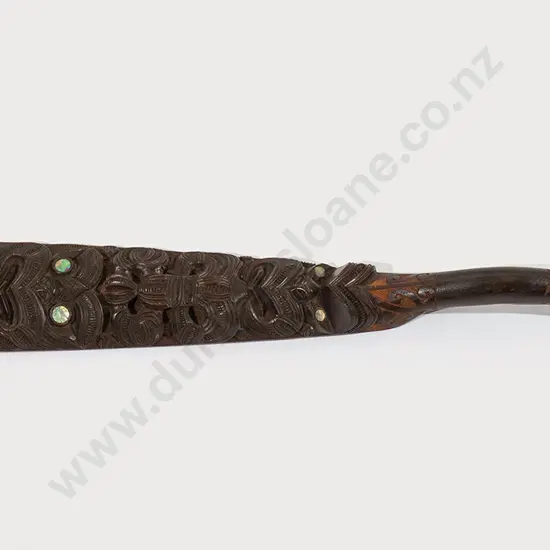 A finely carved hoe