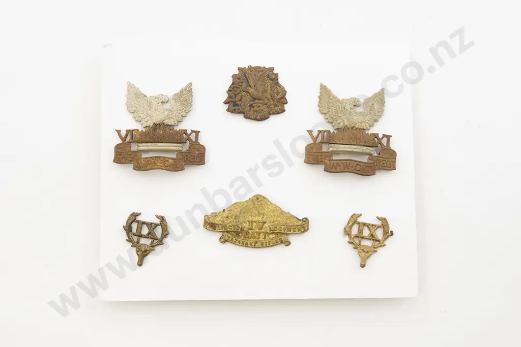 WWI NZ Regimental Cap and Collar Badges Image 1++