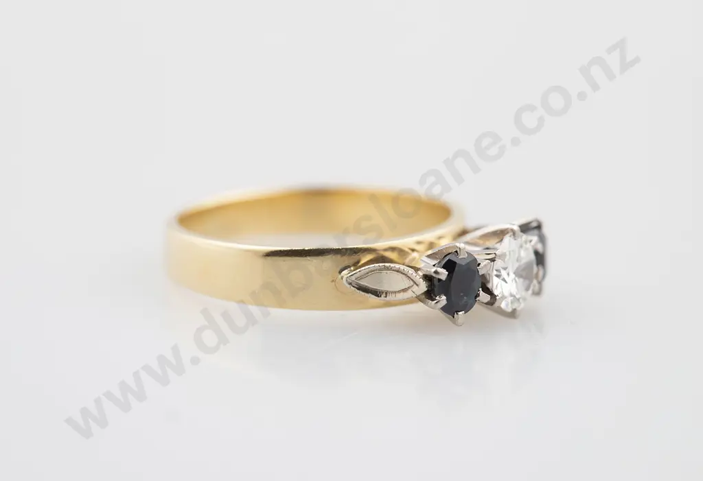 18ct Three Stone Sapphire and Diamond Bridge Ring Image 1++