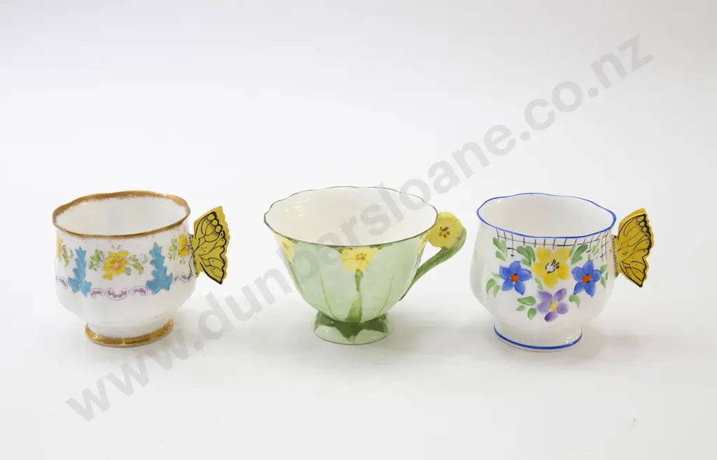 Two Butterfly Handled Teacups and One Other Image 1++