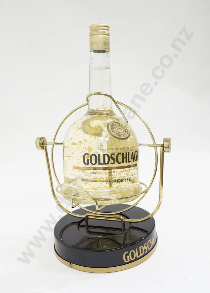 Goldschlager Cinnamon Schnapps 1.75L On Branded Dispenser Stand Image 1++