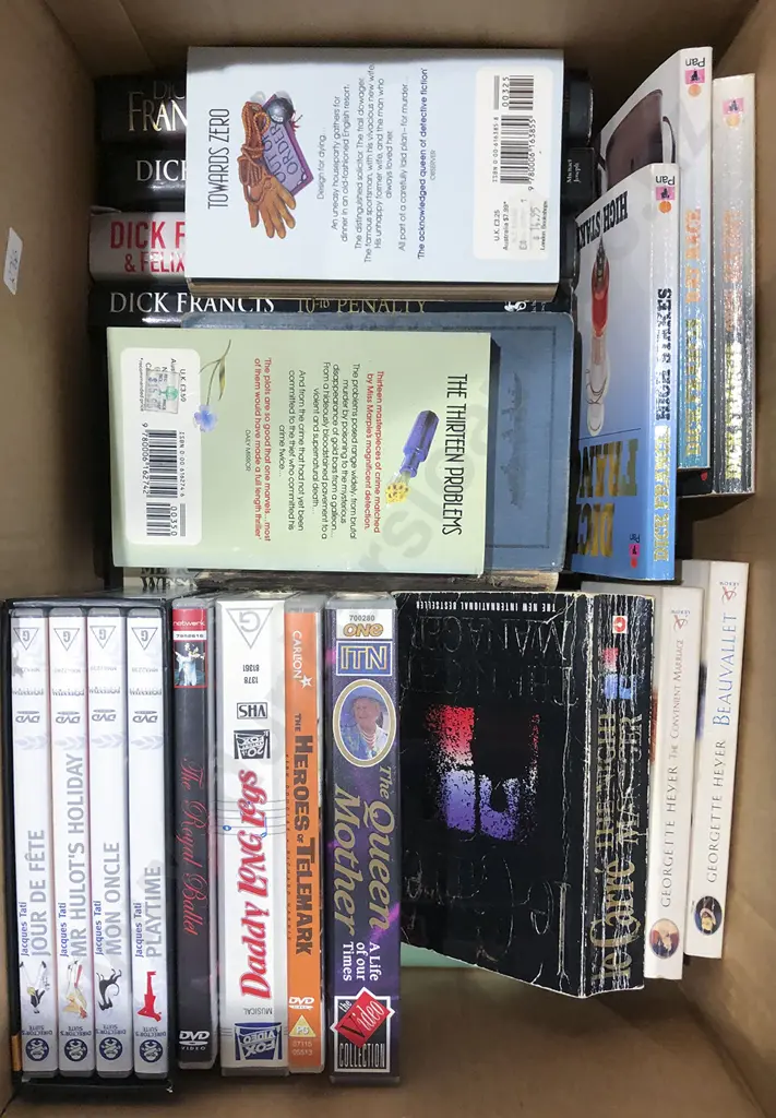 Two Boxes of Books and DVDs Image 1++