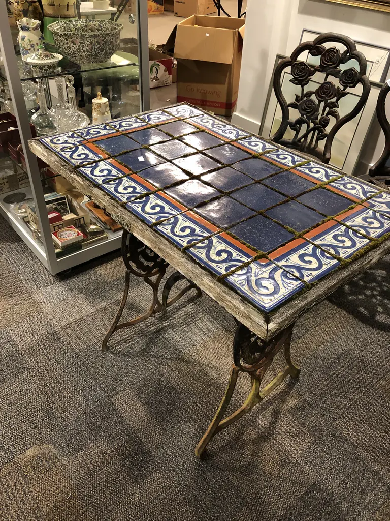 Tile Top Outdoor Table with Wrought Metal Sewing Machine Base Image 1++