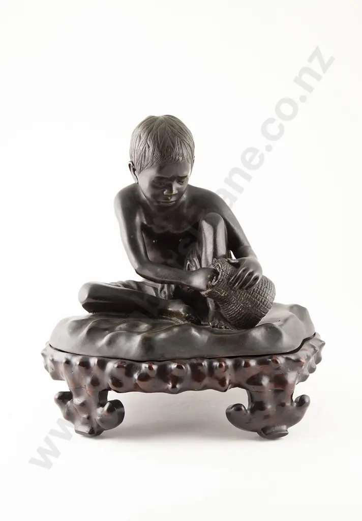 Asian Bronze of Seated Boy With Basket Image 1++