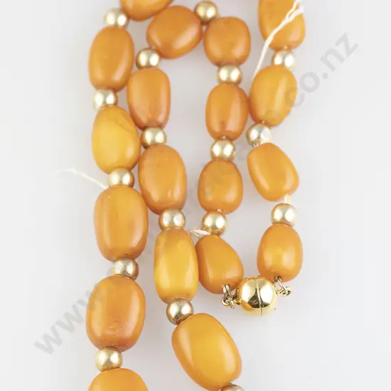 Single Strand Slightly Graduated Amber Bead Necklace