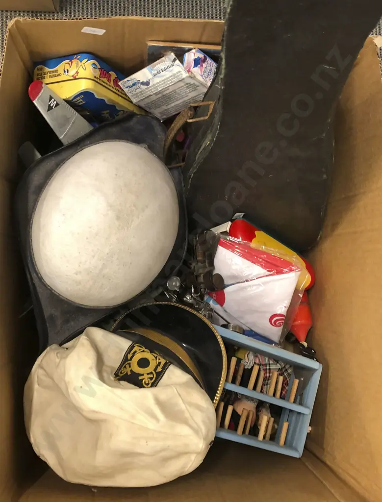 Box of Toys and Hats With Ukulele Image 1++