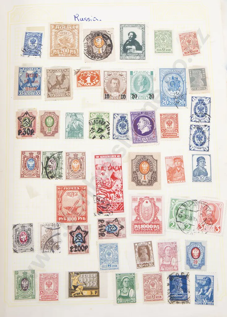 Four Vintage World Stamp Albums Image 1++