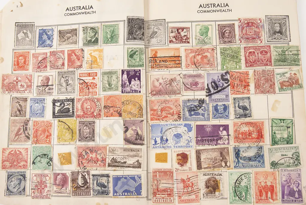 Four Small Vintage World Stamp Albums Image 1++