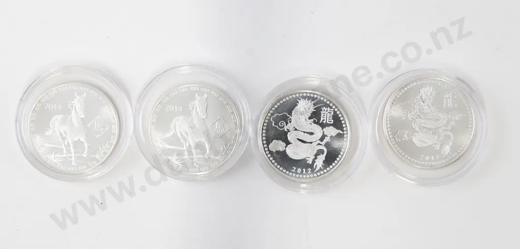 Four 1oz Silver Coins Image 1++