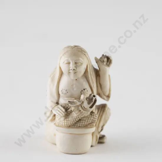 Ivory Netsuke Of A Seated Woman & Dragon
