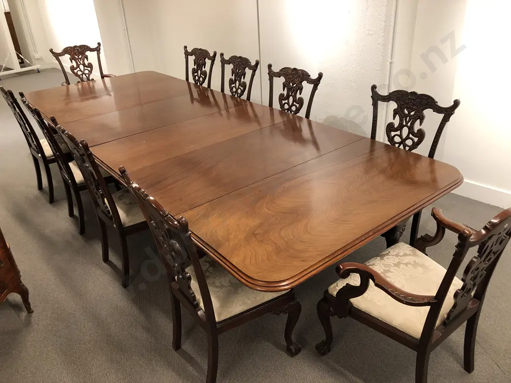 A Superb Victorian Mahogany Extension Dining Table Leaf Holder and Twelve Chippendale Style Chairs Image 1++