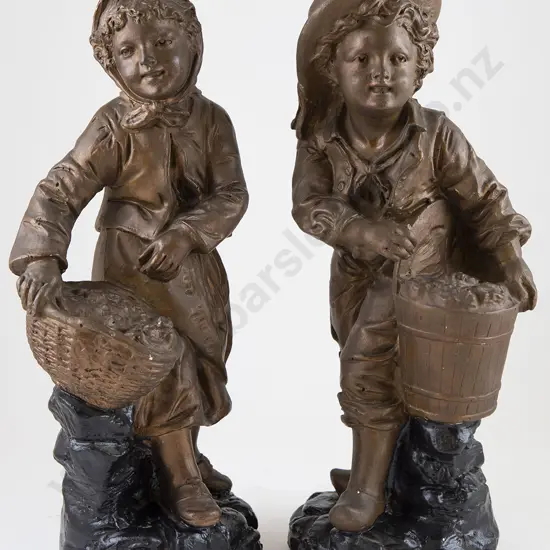 Pair Painted Ceramic Figures of young boy and girl