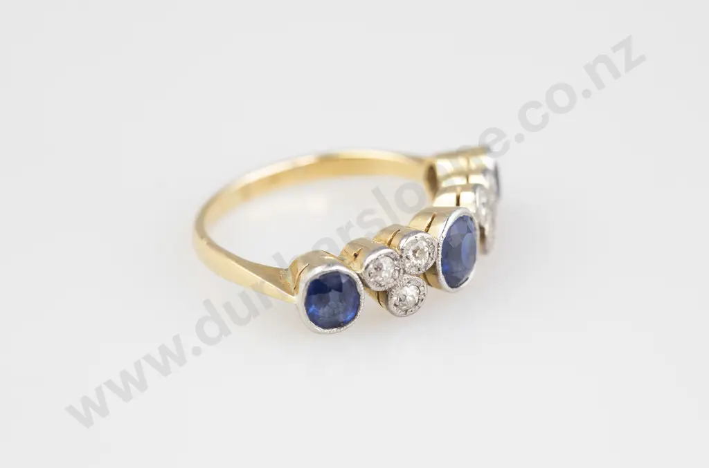 18ct Nine Stone Sapphire and Diamond Bridge Ring Image 1++