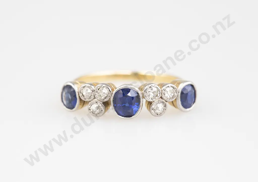 18ct Nine Stone Sapphire and Diamond Bridge Ring Image 1++