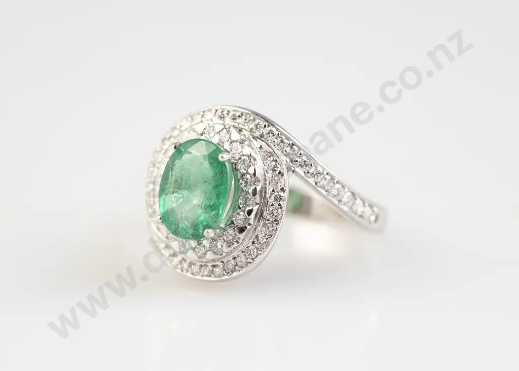 18ct White Gold 67stone Emerald and Diamond Cluster Ring Image 1++