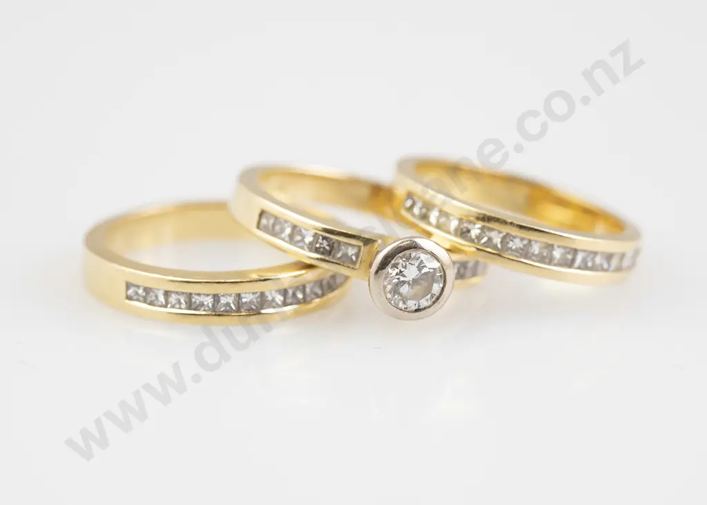 Trio 18ct Solitaire Diamond Ring and Two Diamond Wedding Bands Image 1++
