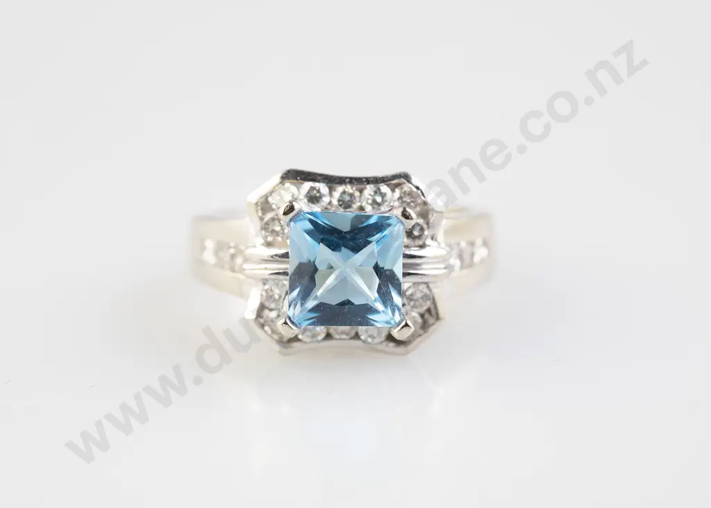14ct White Gold Single Topaz and Diamond Dress Ring Image 1++