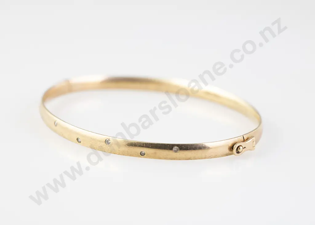 9ct Seven Stone Diamond Hinged Snap Bangle Image 1++