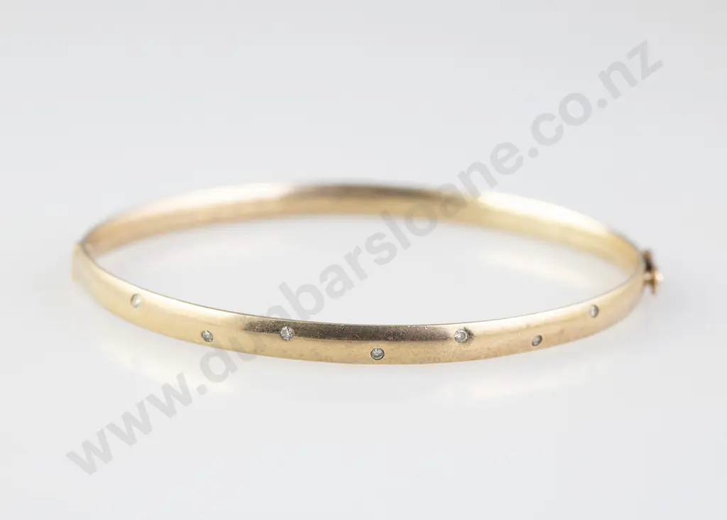 9ct Seven Stone Diamond Hinged Snap Bangle Image 1++