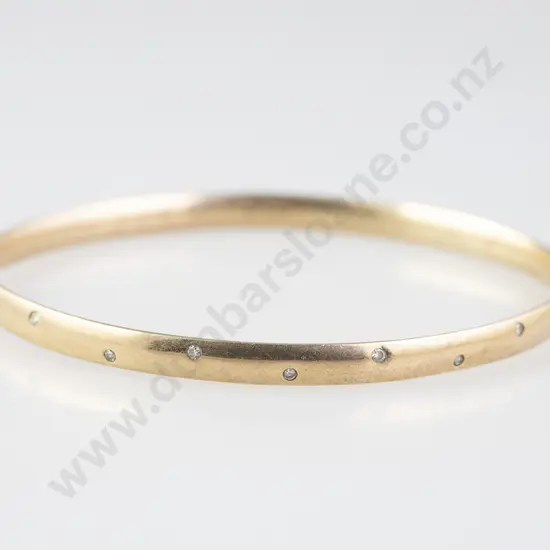 9ct Seven Stone Diamond Hinged Snap Bangle