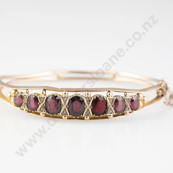 Victorian 9ct Seven Stone Garnet Hinged Snap Bangle