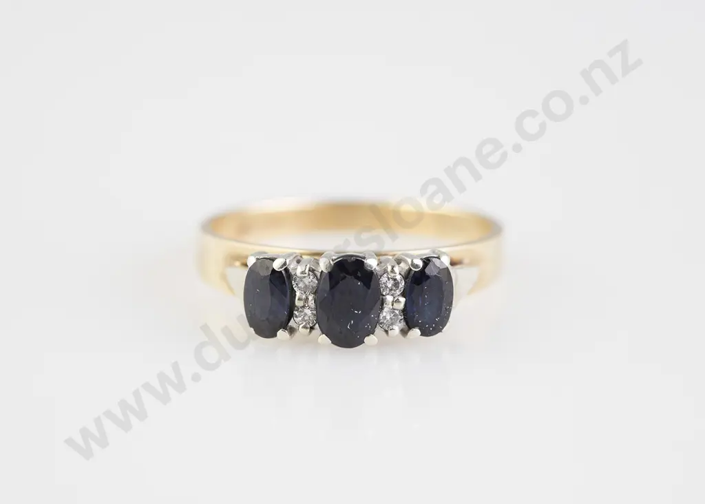 9ct Seven Stone Sapphire and Diamond Bridge Ring Image 1++